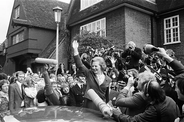 Margaret Thatcher British Prime Minister waving to the crowd after leaving her home in