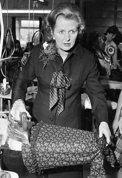 Margaret Thatcher does a spot of ironing during a visit to A Pawson at Sunderland