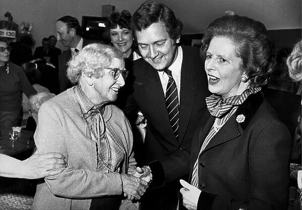 Margaret Thatcher with Jeremy Handley during visit to pensioners day centre - April 1983