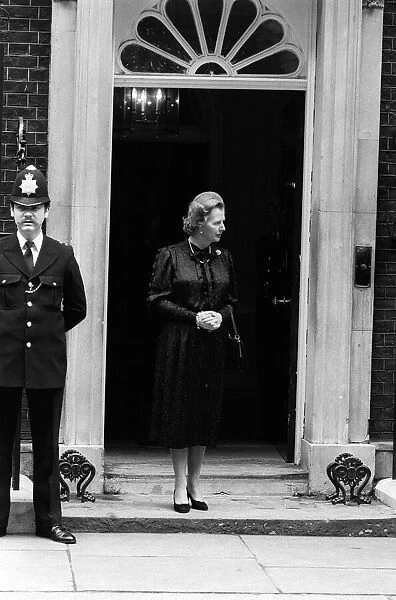 Margaret Thatcher June 1981 stands outside 10 Downing Street waiting for the arrival of