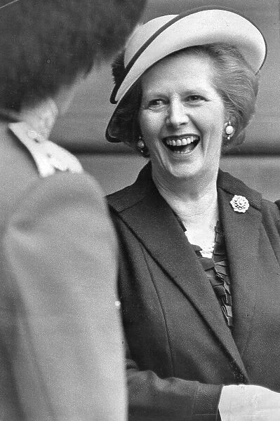 Margaret Thatcher laughing with a Guards Officer during official ceremony - May 1985