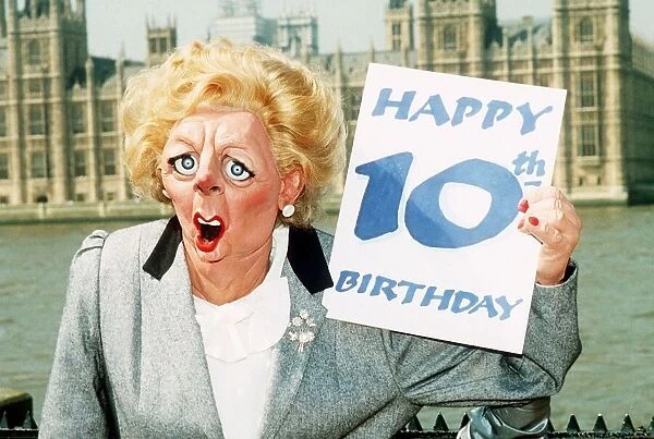 Margaret Thatcher MP Puppet holding up 10th Happy Birthday card. 1989