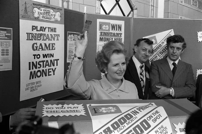 Framed Print : Margaret Thatcher October 1977 holds up an instant game ticket at the Conservative Party Framed Print : Margaret Thatcher October 1977 holds up an instant game ticket at the Conservative Party