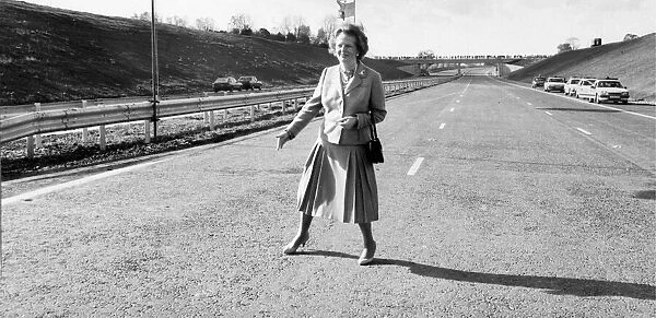 Margaret Thatcher PM officially opens the M25 Motorway, which is 117 miles long