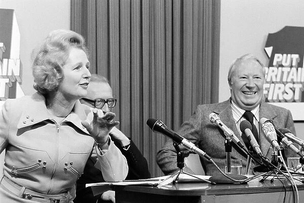 Margaret Thatcher speaking at an election press conference with Edward Heath