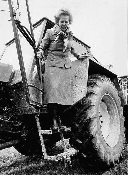 Margaret Thatcher stepping down from tractor during visit to farm - May 1983