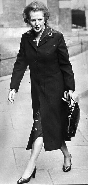Margaret Thatcher walking along Downing Street - April 1982