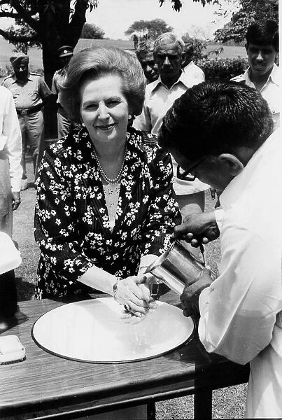 Margaret Thatcher washing her hands during her tour of India - 20th April 1981