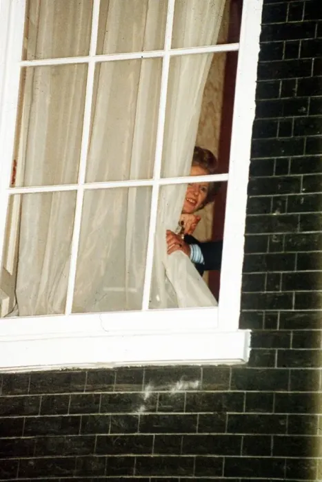 Framed Print : Margaret Thatcher watches through the window at No 10 Downing Street 1990 Framed Print : Margaret Thatcher watches through the window at No 10 Downing Street 1990