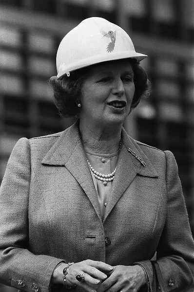Margaret Thatcher wearing a hard hat at the site of Liverpool Street Station in London