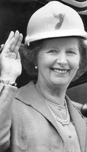 Margaret Thatcher wearing a hard hat during visit to construction site - July 1986