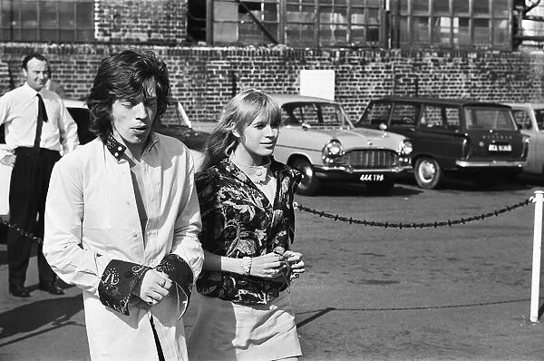 Marianne Faithfull and Mick Jagger take a helicopter ride. 31st July 1967