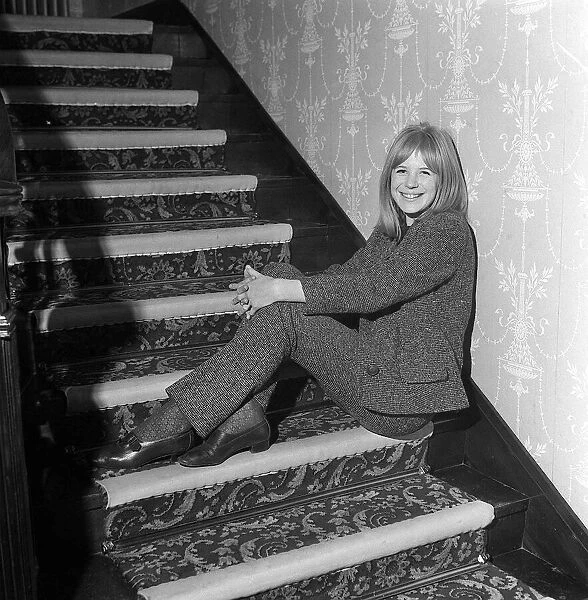 Marianne Faithfull singer and actress December 1964 Sitting on a staircase