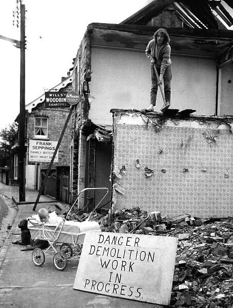 Marie Drury at work in Sudbury, Suffolk, demolishing buildings