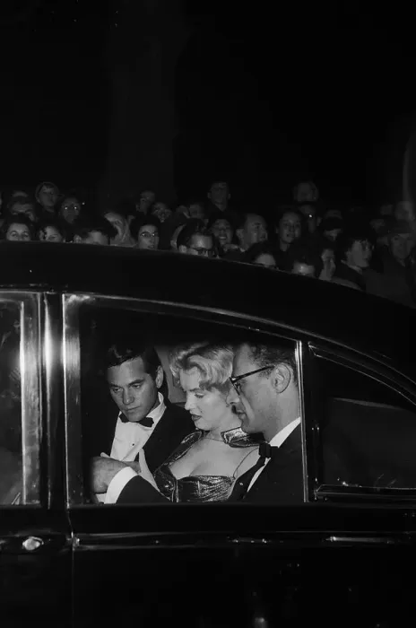 Framed Print : Marilyn Monroe arriving at the Royal Film Performance in a car with Arthur Miller