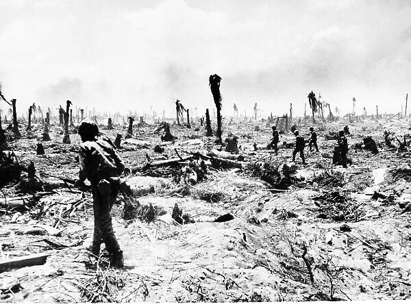 US Marines advance on Barry Island in the Marshall Islands in the wake of fleeing