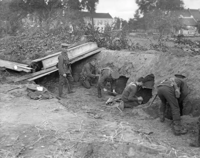 Framed Print : Marines from the Naval brigade digging holes into the side of the trench in which they Framed Print : Marines from the Naval brigade digging holes into the side of the trench in which they