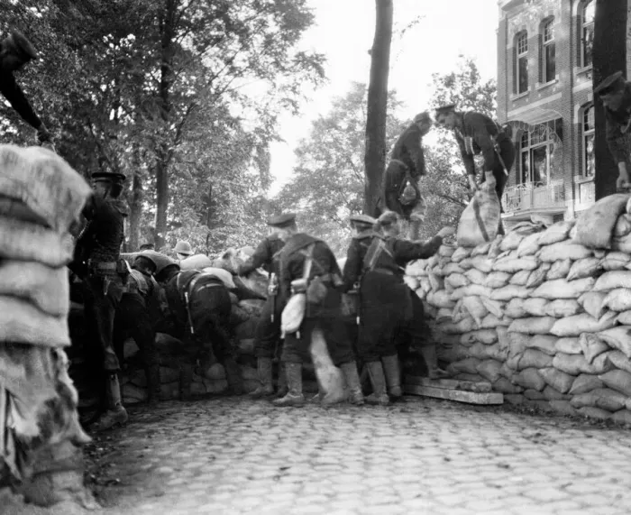 Framed Print : Marines from the Naval Brigade seen here building a sandbag barricade behind which they