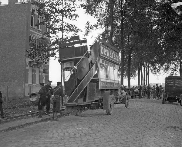 Marines from the Naval Brigade seen here off loading barrels from a London omnibus at