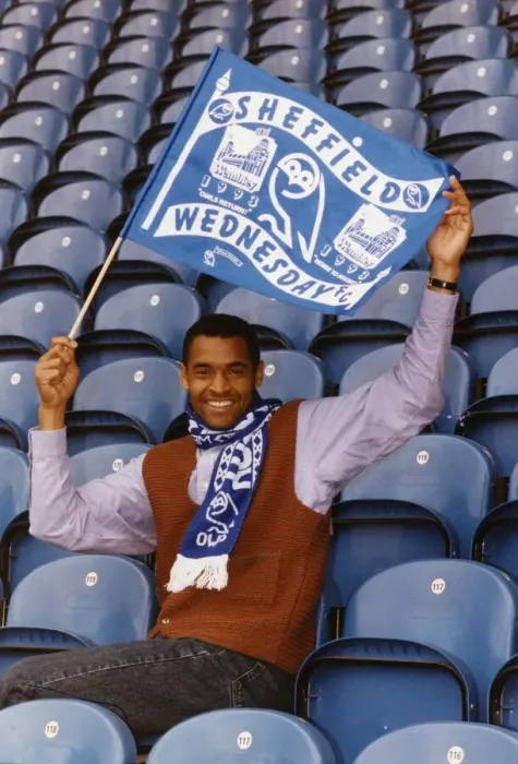 Framed Print : Mark Bright footballer for Sheffield Wednesday sits in seats and waves a flag Framed Print : Mark Bright footballer for Sheffield Wednesday sits in seats and waves a flag