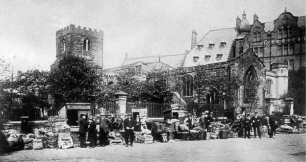 A market near St. Andrews Church in Newcastle. c. 1900