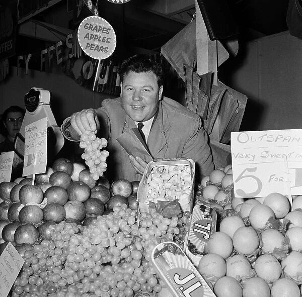 Market stall holder in Wigan. 3rd November 1960
