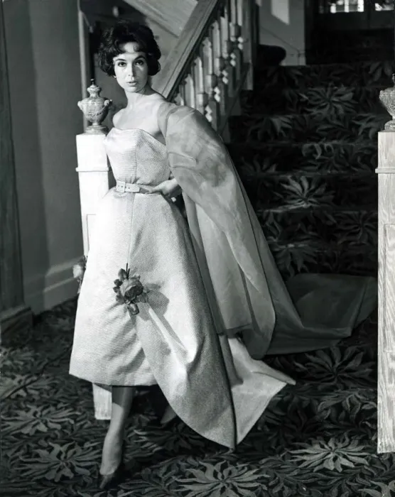 Framed Print : Marla Scarafia Woman coming down the stairs pouting dramatically at the camera in a Framed Print : Marla Scarafia Woman coming down the stairs pouting dramatically at the camera in a