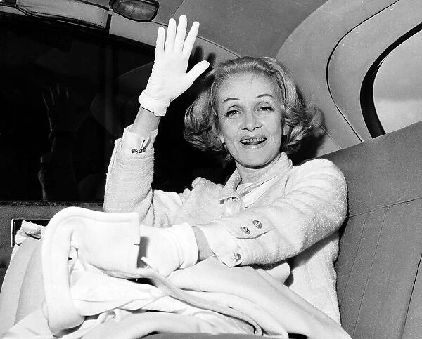 Marlene Dietrich actress sitting in back of car September 1965 Coat jacket and gloves