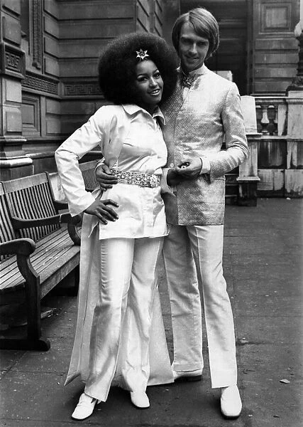 Marsha Hunt star of the musical Hair, wearing a silk coat and satin trousers