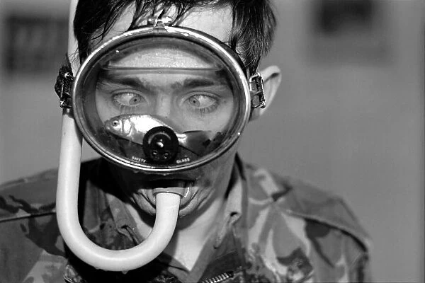 Martin Chapman. Goldfish in diving mask. January 1975 75-00642