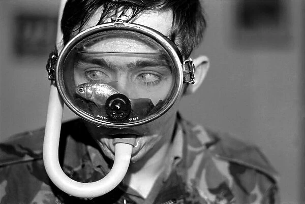 Martin Chapman. Goldfish in diving mask. January 1975 75-00642-001