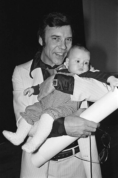 Marty Wilde and his baby daughter Roxanne. 5th March 1980