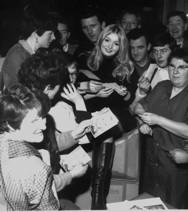 Framed Print : Mary Hopkin welsh singer Feb 1969 signing photographs of herself in Dundee Framed Print : Mary Hopkin welsh singer Feb 1969 signing photographs of herself in Dundee