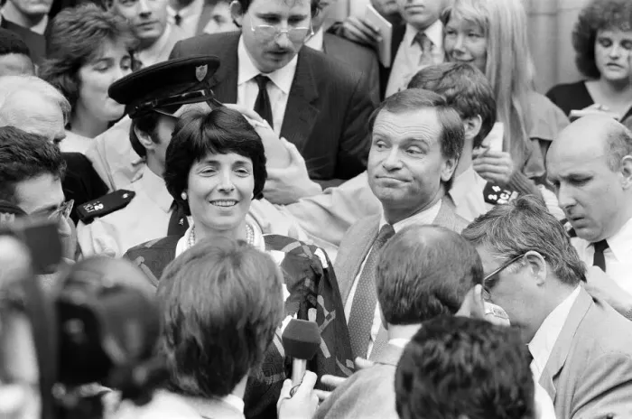 Framed Print : Mary and Jeffrey Archer show their delight in the crowd outside the High Court as they