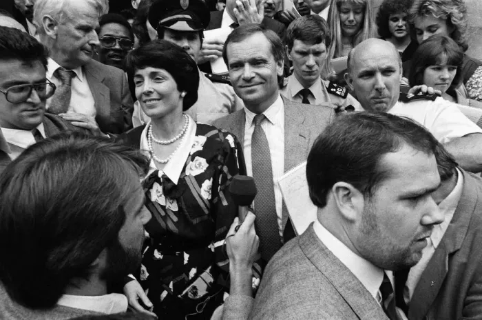 Framed Print : Mary and Jeffrey Archer show their delight in the crowd outside the High Court as they