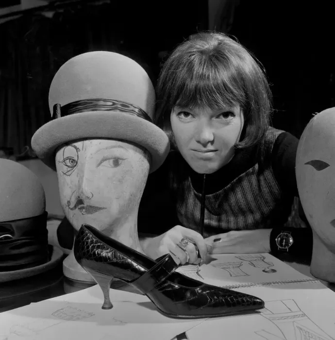 Framed Print : Mary Quant, clothes designer, standing inside her shop Bazaar with examples of the shoes Framed Print : Mary Quant, clothes designer, standing inside her shop Bazaar with examples of the shoes