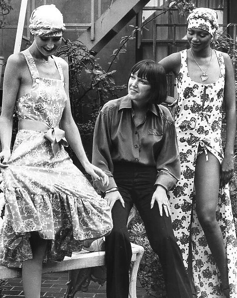 Mary Quant Fashion designer with two models showing off her Spring 1976 collection