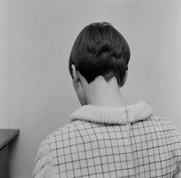 Mary Quant (pictured) turning round to show the camera the back of her head