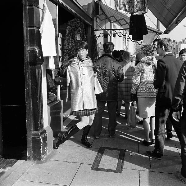 Mary Tyler Moore, star of The Dick Van Dyke Show, walking down Kings Road