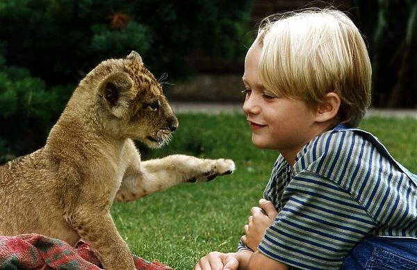 Mason Gamble who stars in Dennis met 8 week old Bellamy at Londons Regents Park Zoo this