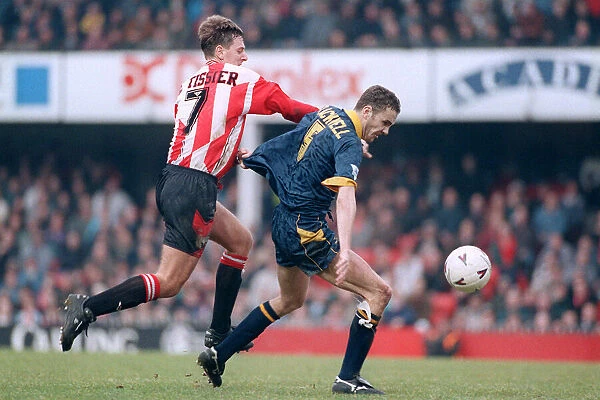 Mathew Le Tissier of Southampton tackles Dean Blackwell of Wimbledon during the two