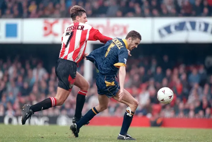 Framed Print : Mathew Le Tissier tackles Dean Blackwell 1994 during Southampton v Wimbledon