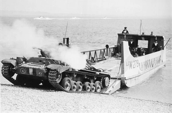 A Matilda Tank landing on a beach as she shows out a smoke screen