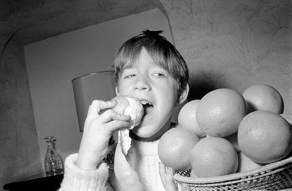 Matthew Ives, timed by his sister Sally, eating his way to a world record by consuming 12