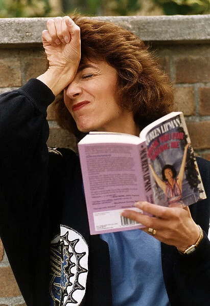 Maureen Lipman actress in dramatic pose while reading her book Thank you for having me