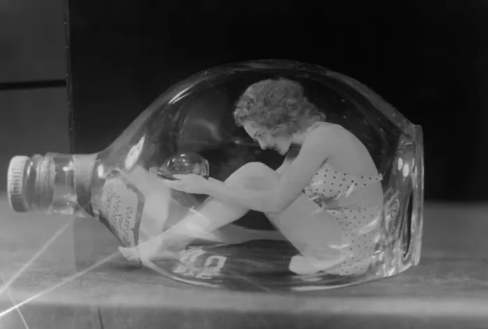 Framed Print : Maureen O Dea Windmill Theatre Girl, photographed in glass bottle Framed Print : Maureen O Dea Windmill Theatre Girl, photographed in glass bottle