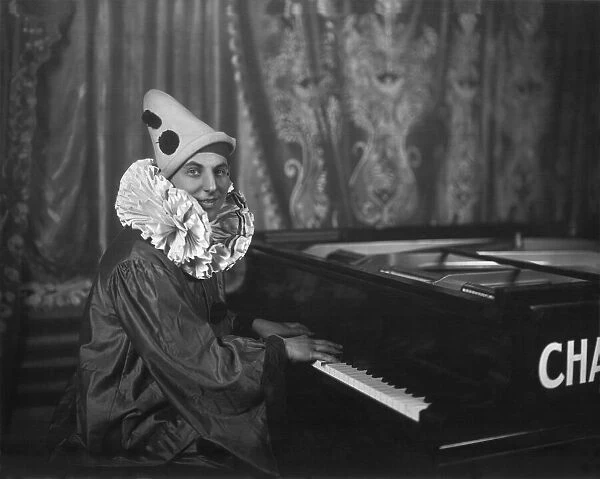 Maurice Besly seen here as a clown perform in the play 'The Village Concert'