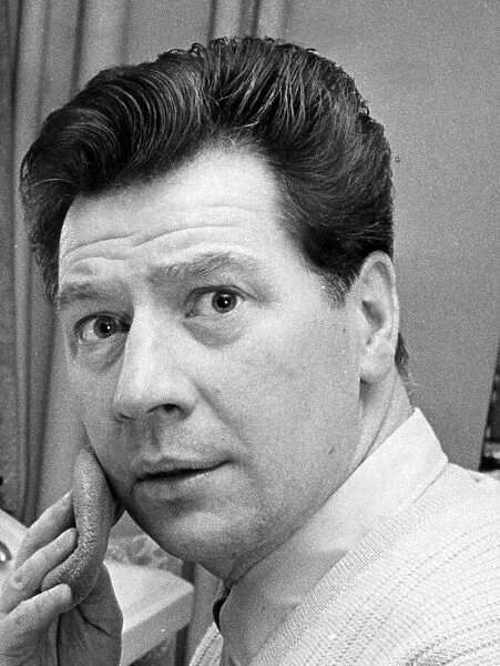 Max Bygraves making up in his dressing room backstage at theatre - January 1965