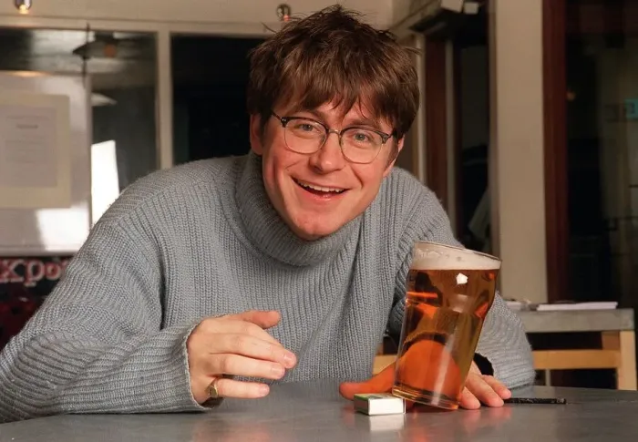 Framed Print : Will McDonald TV Presenter & TFI Friday stage mgr Nov 98 Sitting at bar with pint