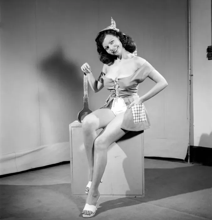 Framed Print : The Mechanic: Woman in fancy dress holding large spanner. 1959 E26 Framed Print : The Mechanic: Woman in fancy dress holding large spanner. 1959 E26
